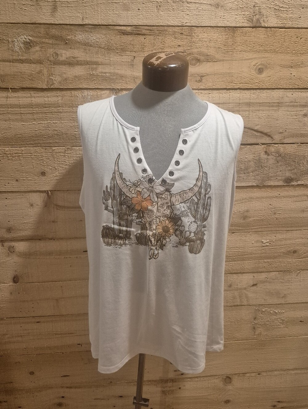 5/$30 or 10/$50. Sleeveless White Graphic Tank Top with Studded V-Neck